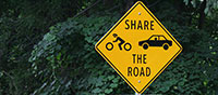 share the road traffic sign